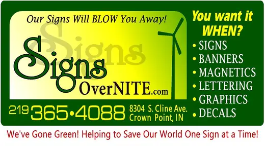 Signs OverNITE promotional sign with the shop phone number