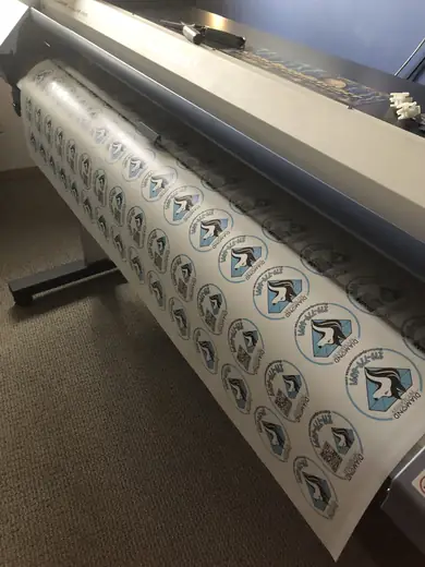 Roll of freshly printed and cut stickers